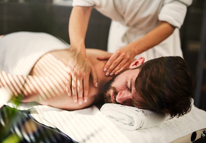 Man having back massage at the health spa